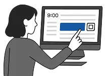 A woman cloning an appointment on her computer